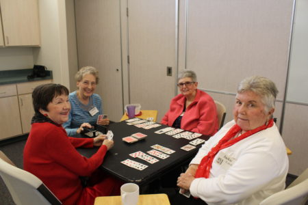 Ladies enjoying a good game of cards at Desert Sages. Photo.