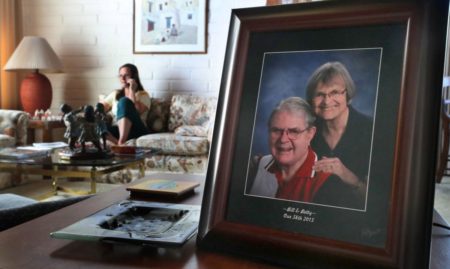 Susan Hillman chats on the phone with her mother, Betty Hillman, 85. Photo.